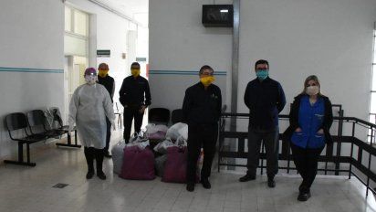 El Rotary entregó batas y barbijos confeccionados por vecinos