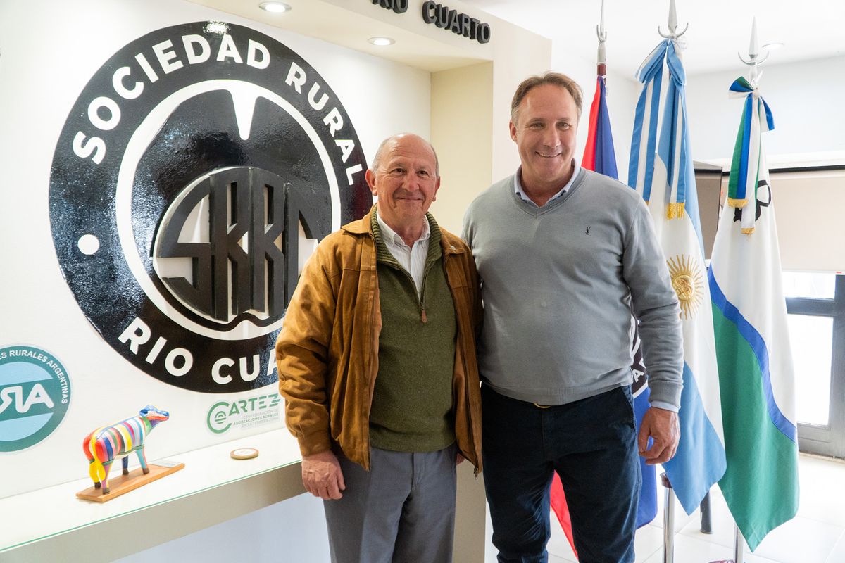 Carlos Castagnani y el presidente de la Sociedad Rural de Río Cuarto, Heraldo Moyetta.