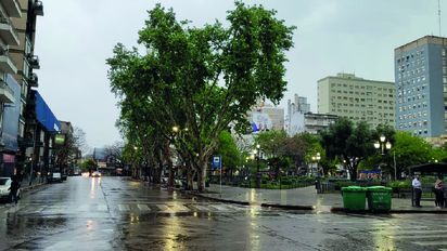 Postales de un viernes de lluvia en la ciudad