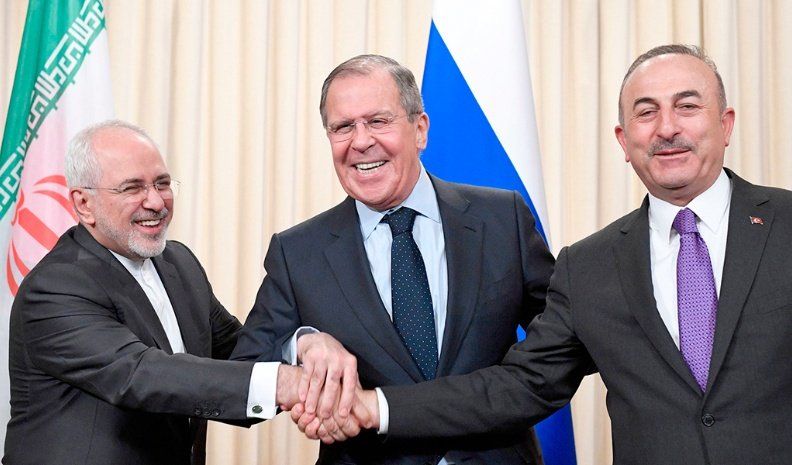 Rusia, Irán y Turquía buscan la salida a la guerra en Siria