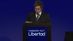 milei en el palacio libertad en un debate academico