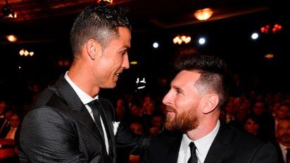 Messi y Ronaldo, en un palco