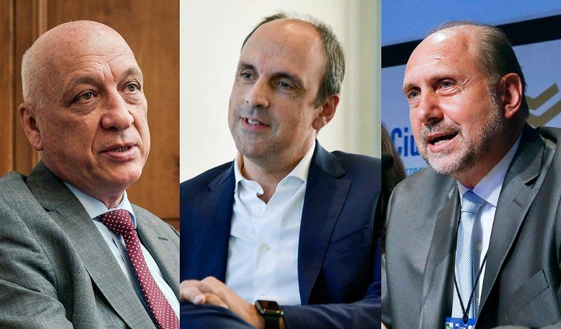 Antonio Bonfatti del Frente Progresista, José Corral de Cambiemos y Omar Perotti del Partido Justicialista.